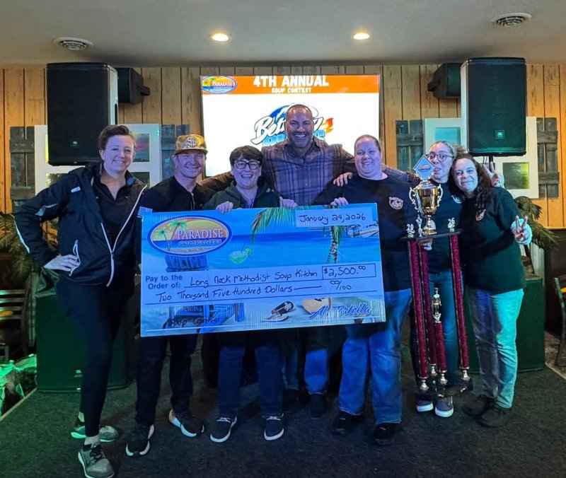 Celebrating the winner of the 2026 Paradise Pub Soup Competition are (l-r) BA Racine-Kerezsi, Paradise Companies events director; Bryan Sears, Paradise Companies director of operations; Robin Brown, Long Neck Methodist soup kitchen volunteer; Al Tortella, Paradise Companies owner; Ashley Paulson, winning chef, Holly Lake Grill; and Hannah Scarborough and Nicole Addis, Holly Lake employees.